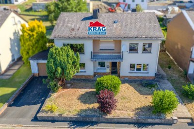 ++ KRAG Immobilien ++ Viel Raum für Familien: Einfamilienhaus mit Garten, Garage & Potenzial