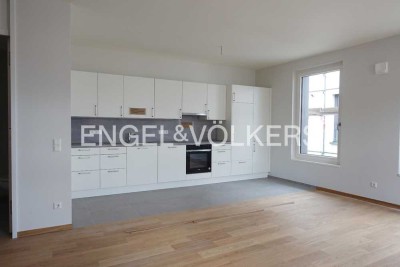Neubau-Erstbezug • Großzügige und hochwertige 2-Zimmer-Wohnung mit Einbauküche und Südwest-Balkon