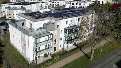 Zukunftssicher durch neuste Haustechnik - Erdgeschosswohnung mit Ost-Terrasse und tollem Garten
