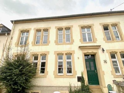 Ein Haus voller Tradition und Charme mit einem gemütlichen Garten