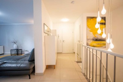 Stilvolle, gepflegte Maisonette-Wohnung mit lux. Innenausstattung mit Balkon und EBK