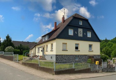 Großzügiges Dreifamilienhaus mit Einliegerwohnung in zentraler Lage