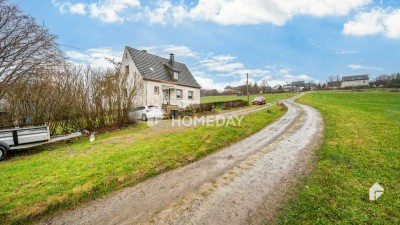 Charmantes Einfamilienhaus in idyllischer Hanglage mit großem Potenzial