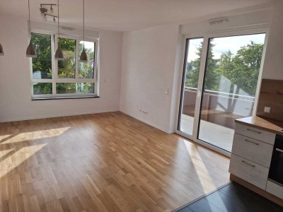 Attraktive 2-Zimmer-Wohnung mit Einbauküche, Balkon, Tiefgaragenstellplatz und Tageslichtbad