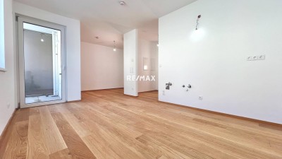 Erstbezug – 2-Zimmer-Charakter-Wohnung mit Loggia, Luft-Wärmepumpe &amp; PV-Anlage