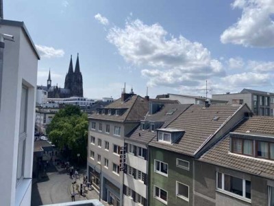 Stilvolle Eigentumswohnung in Rheinnähe mit atemberaubendem Blick auf den Dom