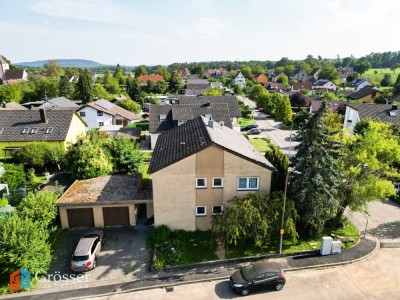schönes Mehrfamilienhaus mit 4 Garagen und Potential