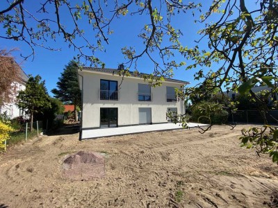 Neubau-Erstbezug - Einliegerwohnung im EFH mit 112 m² Nutzfläche mit Terrasse und Garten