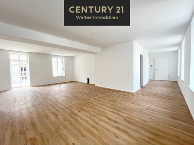 Moderne 3-Zimmerneubauwohnung mit denkmalgeschützter Fassade!