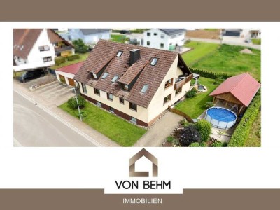 von Behm Immobilien -  Gepflegtes Zweifamilienhaus mit außergewöhnlichem Gartenidyll