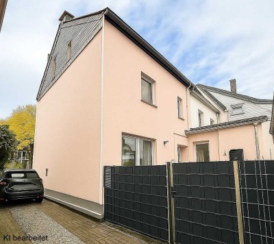 modernisierte Doppelhaushälfte mit XXL-Anbau