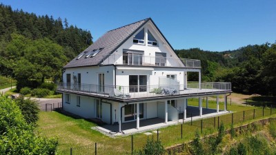 Moderne, Erstbezug-Gartenwohnung mit Traumblick auf den Wörthersee!