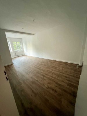 Familienfreundliche 3-Zimmer-Wohnung mit Balkon und Garten