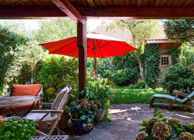 ENGEL & VÖLKERS: Charmante Erdgeschosswohnung mit sehr schönem Garten