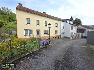 Zwei Häuser zum Preis von einem – vielseitiges Immobilienangebot in ruhiger Seitenstraße