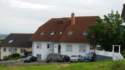 Schöne, geräumige 1 ZKB-Wohnung mit Südgarten und fantastischem Ausblick