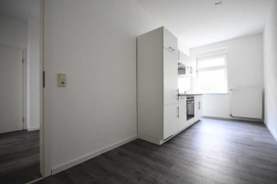modernisierte 1-Raum-Wohnung im EG*Einbauküche*Tageslichtbad mit Wanne