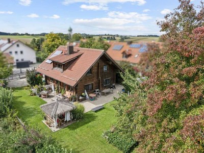 Nachhaltig wohnen: Vermietetes Vollholzhaus in familienfreundlicher Lage im Landkreis Erding