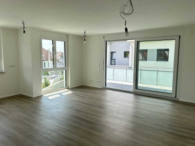 *Erstbestbezug: moderne 4 Zimmer-Wohnung mit Balkon, 2 TG-Stellplätze, Keller, u.v.m.*