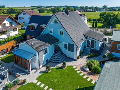 Freistehendes Einfamilienhaus mit großzügigem Anbau und idyllischem Garten !