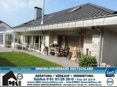 Walmdach-Bungalow mit Wintergarten und 2-Zimmer-ELW in bester Wohnlage