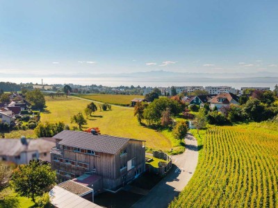 Naturnah Wohnen - Modernes Dreifamilienhaus mit Seeblick