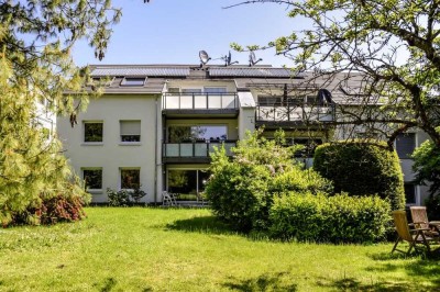 Energetisch sanierte Dachgeschosswohnung im Grünen mit Balkon und Gartenanteil