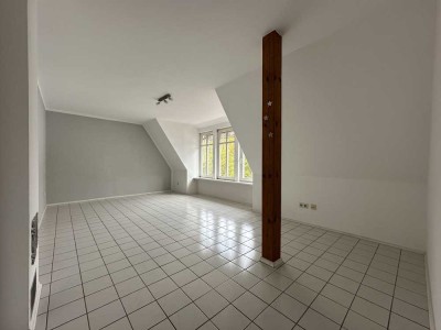 Lichtdurchflutete 4-Zimmerwohnung mit traumhaften Bachblick in zentraler Lage!