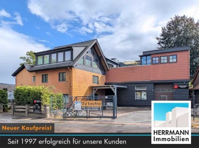 Mehrfamilienhaus mit Halle, Garagen und Ausbaupotenzial
