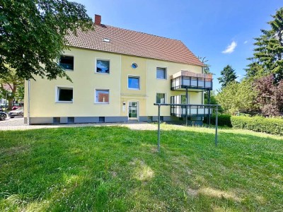 Garten inklusive! Hübsche 3,5-Zimmer-Wohnung mit großer Küche, Duschbad und neuem Balkon.