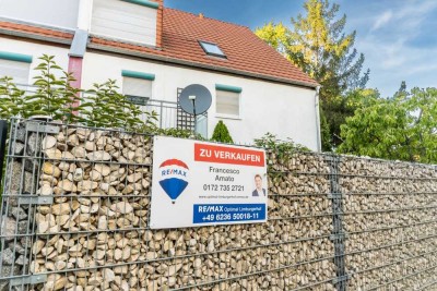 Familienfreundliche Doppelhaushälfte mit Garten und Tiefgarage