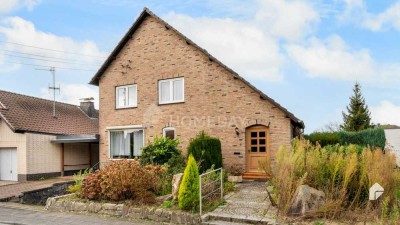 Attraktives Einfamilienhaus mit Terrasse, Gartenlaube, EBK und Garage in ruhiger Lage