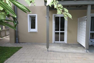 Helles 1 Zimmer-Appartement (EG) mit Einbauküche, 2 Terrassen, Garage mit Stauraum
