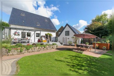 Ihr persönlicher Rückzugsort – Stilvoll modernisiertes Siedlungshaus mit Traumgarten