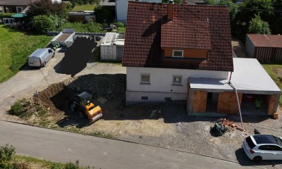 Freistendes Einfamilienhaus im Rohbau mit Garage auf 960qm