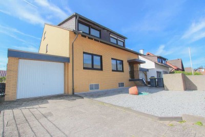 Attraktives Dreifamilienhaus in ruhiger Lage von Kleinenbroich