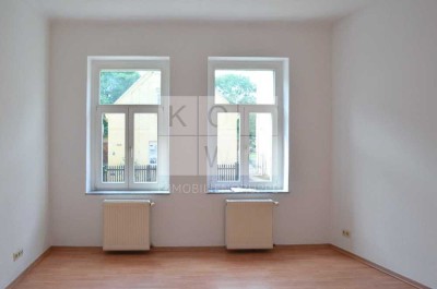 Kleine 1,5-Raum-Wohnung mit Laminat und Wannenbad in Markkleeberg