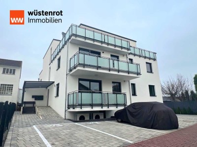 Erstbezug: Helle Neubau-Erdgeschosswohnung mit 3 Zimmern, Balkon & Stellplatz