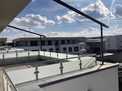 Stilvolles Penthouse mit offener Wohnküche und exklusivem Ambiente