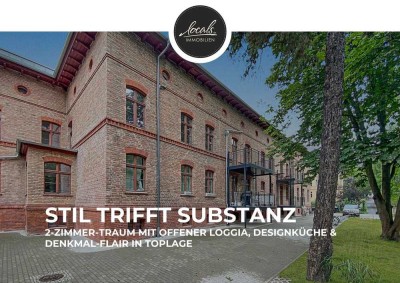 Stil trifft Substanz: 2-Zimmer-Traum mit offener Loggia, Designküche & Denkmal-Flair in Toplage