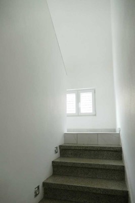 Helle Dachgeschosswohnung mit Balkon