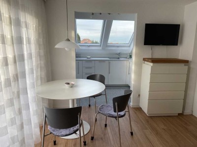 Geschmackvoll möblierte 2,5-Zimmer-Dachwohnung mit Balkon inTamm – all inclusive, sofort verfügbar