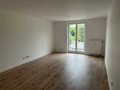 Gut geschnittene 3-Zimmerwohnung mit Balkon in grüner Lage