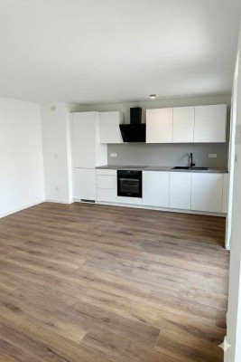 Erstbezug ! Tolle 2-Zimmerwohnung mit EBK, Terrasse und separatem Eingang.