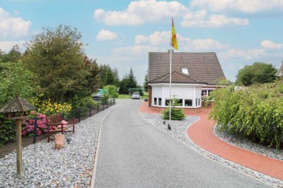 Familientraum mit großer Gartenoase, Wintergarten und überdachter Terrasse in idyllischer Lage