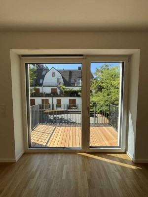 Erstbezug nach Sanierung mit Balkon: Geschmackvolle 3-Zimmer-Wohnung mit zusätzlicher Wohnküche
