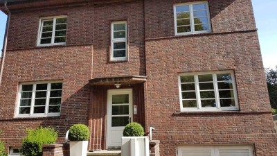 lichtdurchflutete, großzügige 3 Zimmer, Wintergarten, Balkon und Carport mit E-Ladesäule