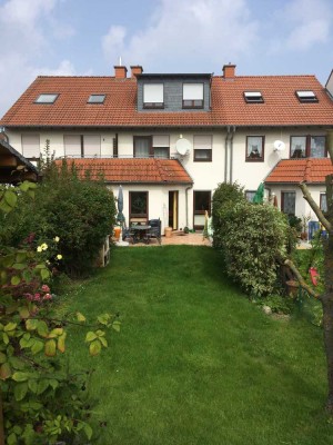 Zuhause ankommen: Reihenmittelhaus mit Südterrasse, Garten & Einliegerwohnung