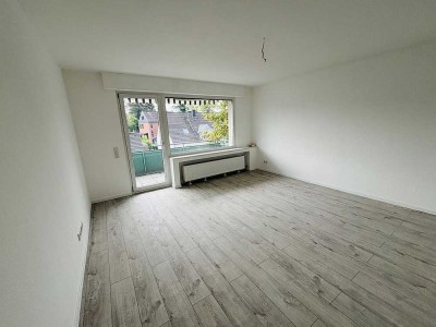 Über den Dächern von Unterbach: Komplett modernisierte 3 Zi. ETW mit Sonnenbalkon!