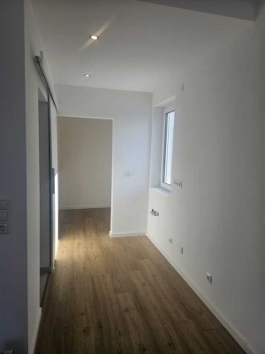 Charmante 1-Zimmer-Wohnung mit großer Dachterrasse in Obermenzing